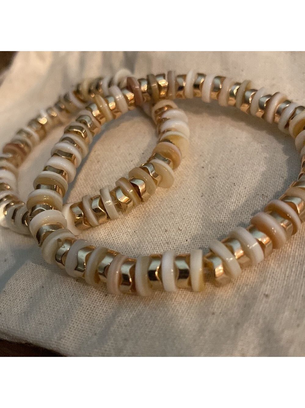 715. One Handcrafted White Shell & Gold Colour Beaded Stretchy Bracelets
